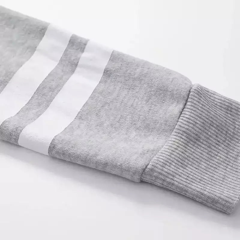 Jogging femme blanc avec capuche et coupe ajustée pour un style décontracté