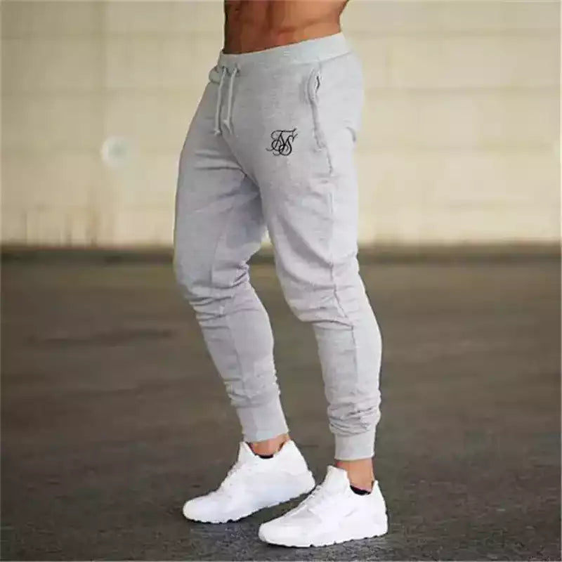 Gros plan sur la taille élastique ajustable du pantalon cargo pour un confort optimal.