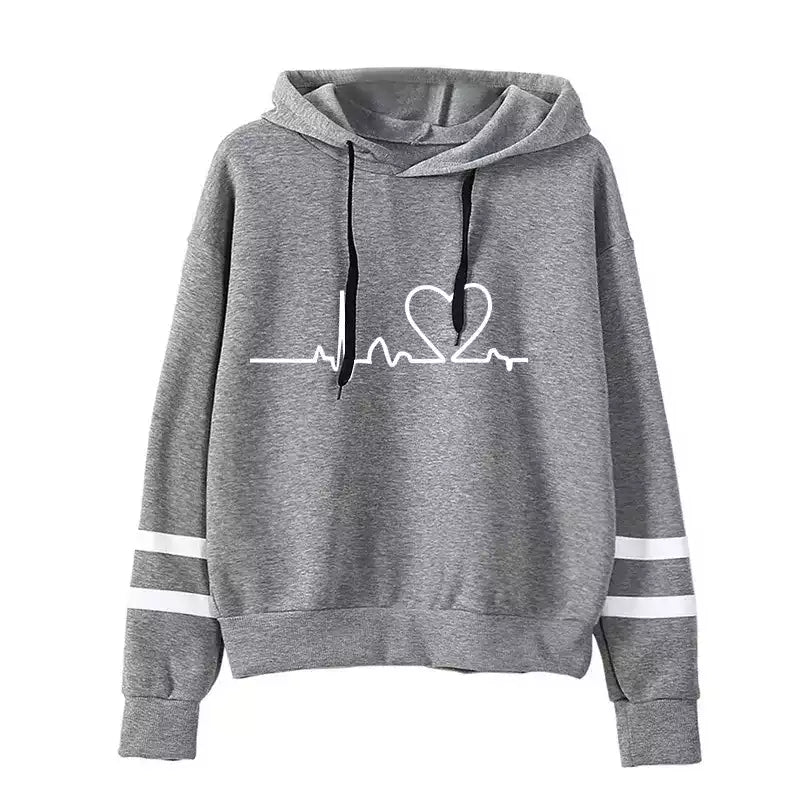 Jogging femme avec rayures latérales pour une touche dynamique et sportive